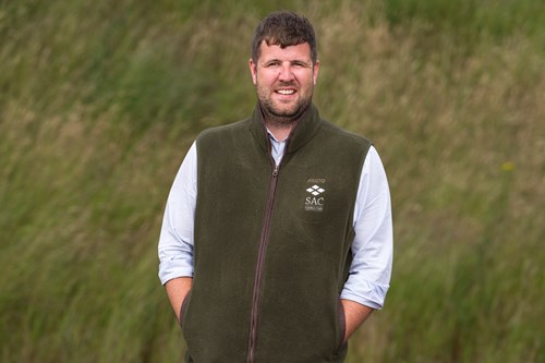 Craig Bothwell standing outside in his SAC Consulting gilet